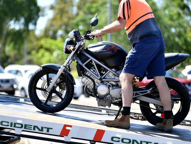 The motorbike being towed away from the crash. Picture: Alix Sweeney