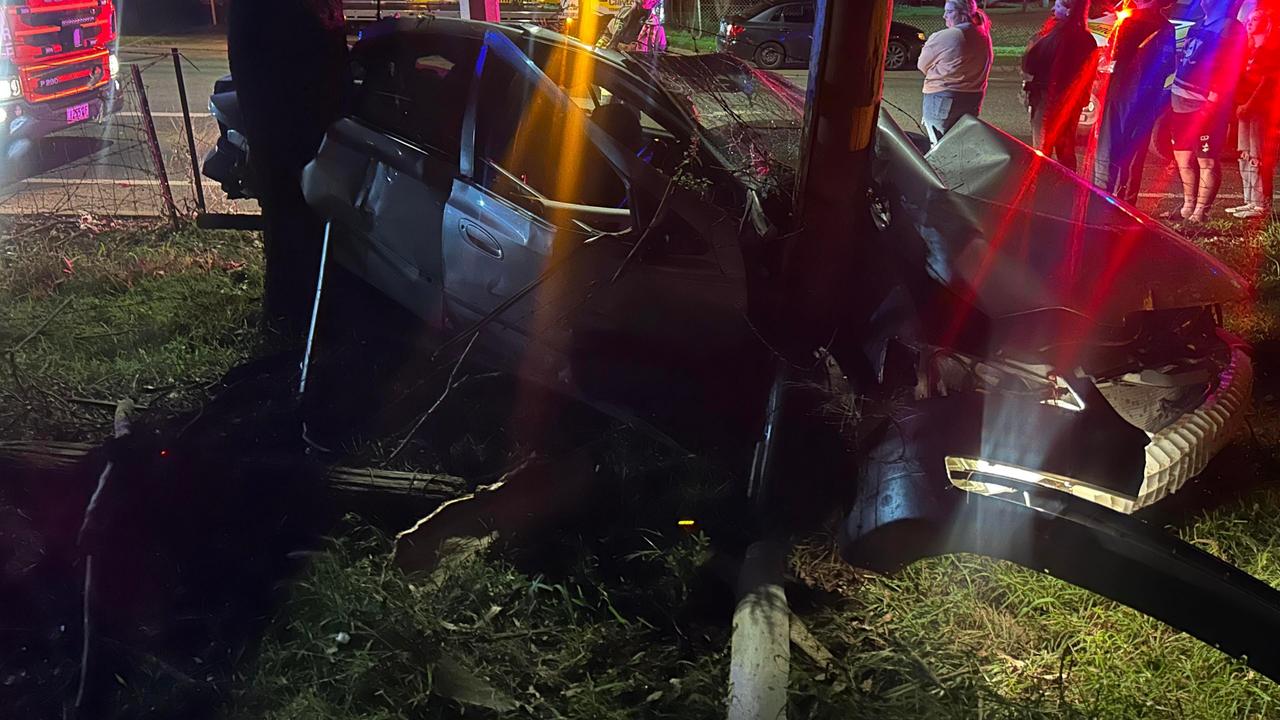 Two people were taken to hospital suffering from minor injuries after their car crashed into a tree on Griffiths Street in Harlaxton on Monday night.