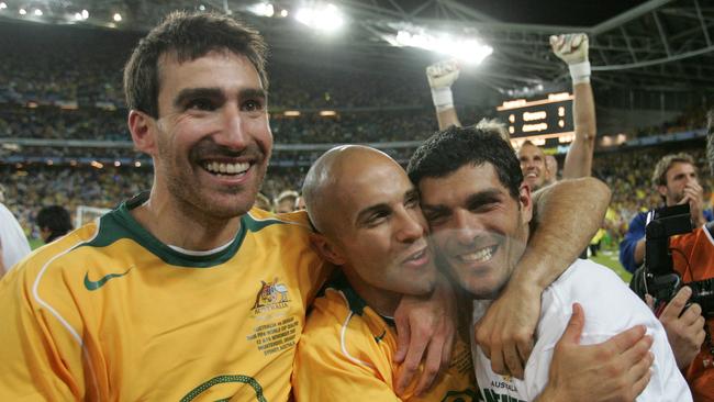 Former Socceroo Tony Vidmar (L) with fellow ex-stars Marco Bresciano and John Aloisi after beating Uruguay in a World Cup qualifying match in 2005. Picture: News Corp