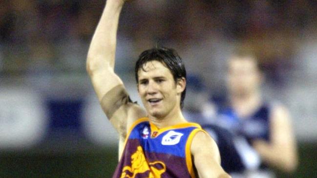 23/08/2003. Aaron Shattock celebrates. Brisbane Lions v Geelong at the Gabba.