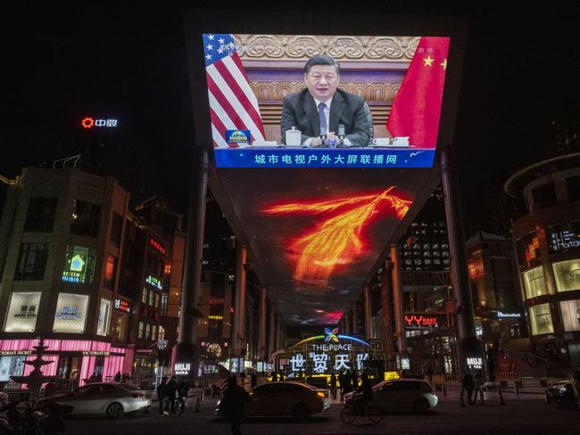 A screen in Beijing display’s Xi Jinping during a summit with Joe Biden. Picture: Kevin Frayer/Getty Images