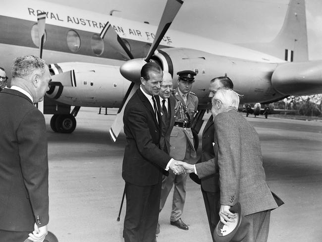 Prince Philip visits Hobart in 1967 in the aftermath of the fires. He arrived aboard a RAAF Vickers Viscount. Picture: Mercury Historical Archive image.