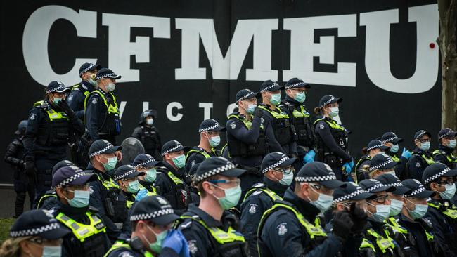 Police block the entrance to the CFMEU offices a day after protesters smashed it. Picture: Getty Images