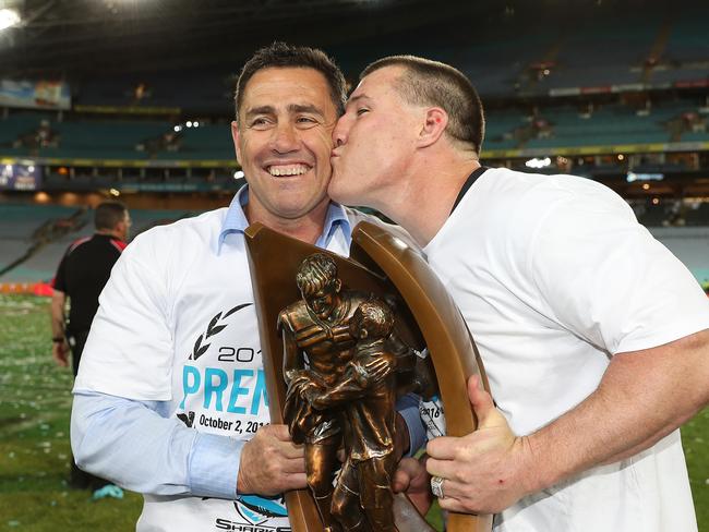 Cronulla’s Paul Gallen kisses coach Shane Flanagan after their grand final win on Sunday night / Picture: Brett Costello