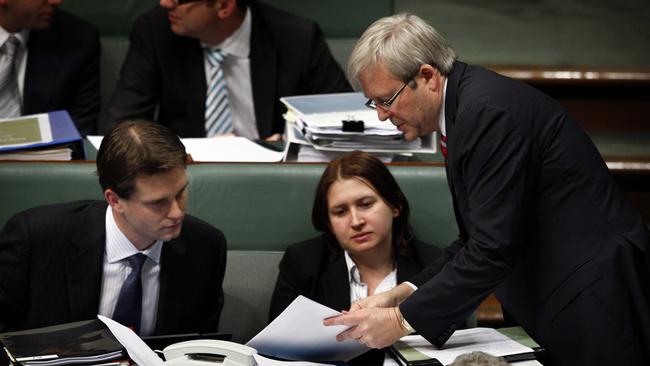 Prime Minister Kevin Rudd confers with senior advisor Dr Andrew Charlton (seated) during Question Time in the House of Representatives of federal parliament House in Canberra. Picture: Ray Strange