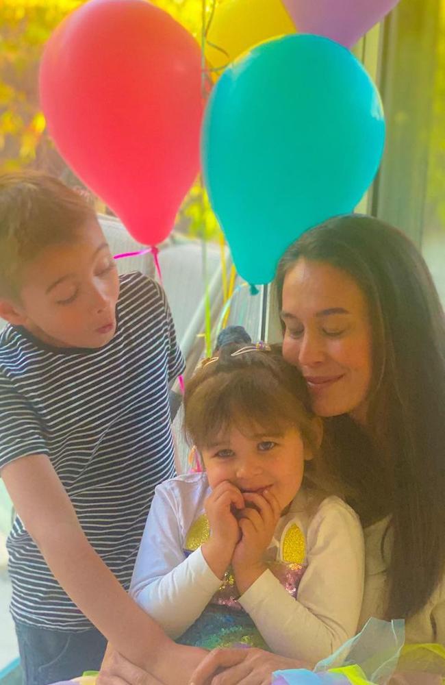 Megan Gale shared this photo in September 2021 with the caption: ‘Blissfully oblivious to lockdowns, pandemics, riots and protests and completely absorbed and obsessed with unicorns, rainbows, ponies and Lego.’