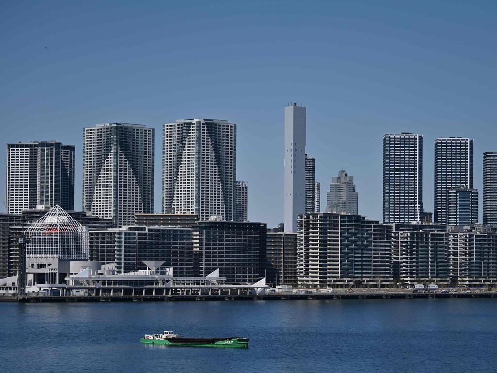 Part of the Olympic village (foreground) is pictured in Tokyo.