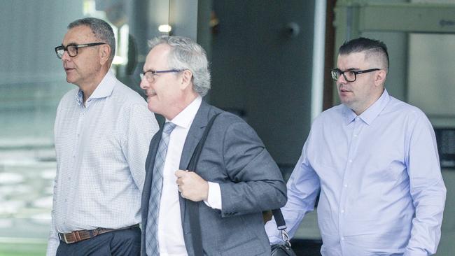 Daniel John Rynenberg (R) leaves Brisbane District Court, where he was sentenced for soliciting nude photos from pre-teen boys over Snapchat. Supported by his father, successful insurance broker, Greg Rynenberg (L). Picture: Nicholas Eagar