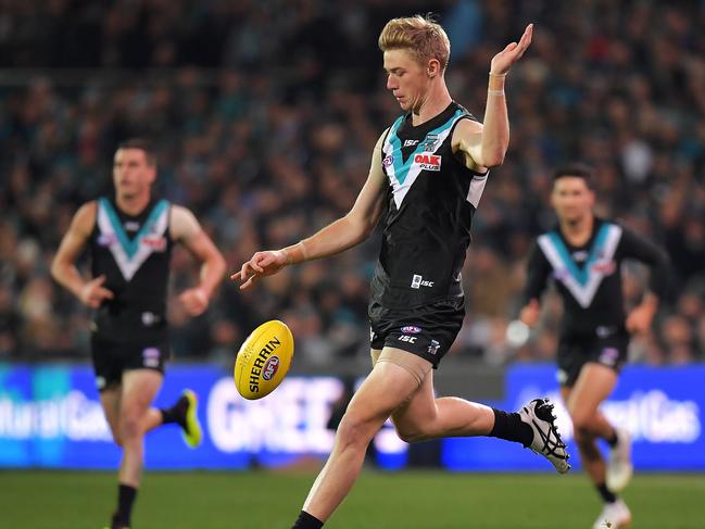 ADELAIDE, AUSTRALIA - JUNE 22: Todd Marshall of the Power kicks the ball during the round 14 AFL match between the Port Adelaide Power and the Melbourne Demons at Adelaide Oval on June 22, 2018 in Adelaide, Australia.  (Photo by Daniel Kalisz/Getty Images)