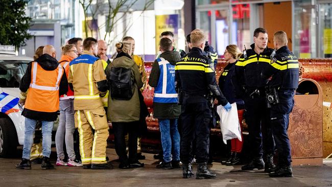 Police arrive at the Grote Marktstraat, one of the main shopping streets in the centre of the Dutch city of The Hague, after several people were wounded in a stabbing incident. Picture: AFP