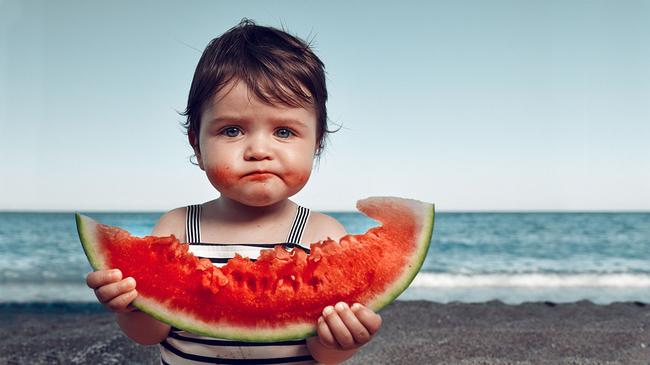 Enjoy your watermelon, small child... it will be your last. Pic via Getty Images