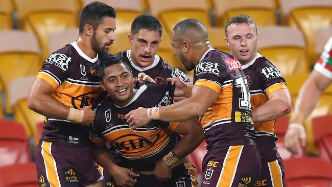 Broncos players celebrate Anthony Milford’s wonder try. Picture: Getty Images