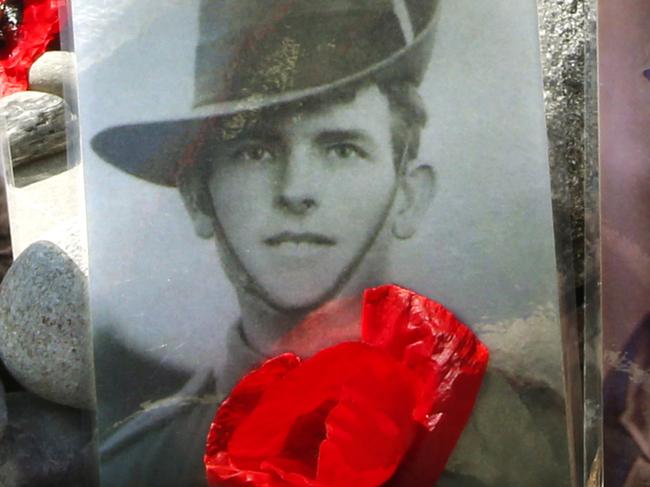 HOLD FOR FRIDAY PAPERS! HS resend. ANZAC 100th Gallipoli. ANZAC Diggers photos lined up on North Beach with Ari Burnu in the background. Picture: David Caird.