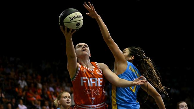 Courtney Woods of the Townsville Fire goes to the basket during the round three WNBL match between Townsville Fire and Bendigo Spirit at Townsville Entertainment Centre, on November 16, 2024, in Townsville, Australia. (Photo by Albert Perez/Getty Images)