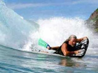 WELCOME BACK MAT: Lennox Head surfer Mark Thomson rides a surf mat off Lennox Point. . Picture: Mark Thomson