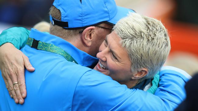 Natalie Cook hugs AOC president John Coates at the Rio Olympic Games. Picture: Brett Costello