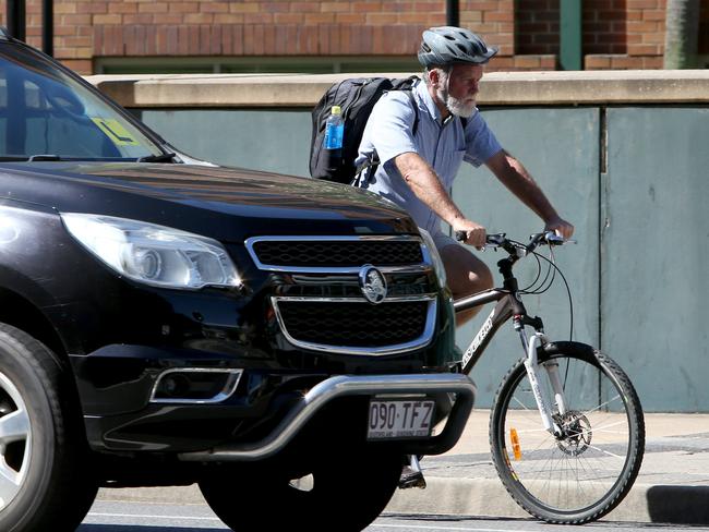 Drivers must leave a one metre gap when passing cyclists on the road. Picture: Steve Pohlner/AAP