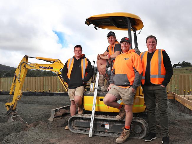 Ben Smith, Jacob Burnett, Luke Smith and Grant Polley are helping build a home that will be sold to raise money for former Cygnet Football Club player, Ryan Wiggins, who suffered a C2 spinal fracture last year. Picture: Nikki Davis-Jones