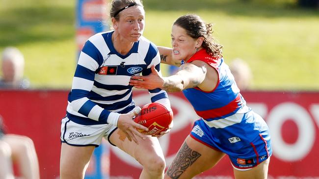 Shelley Scott is tackled by Richelle Cranston during their close encounter. Picture: Dylan Burns/AFL Photos via Getty Images