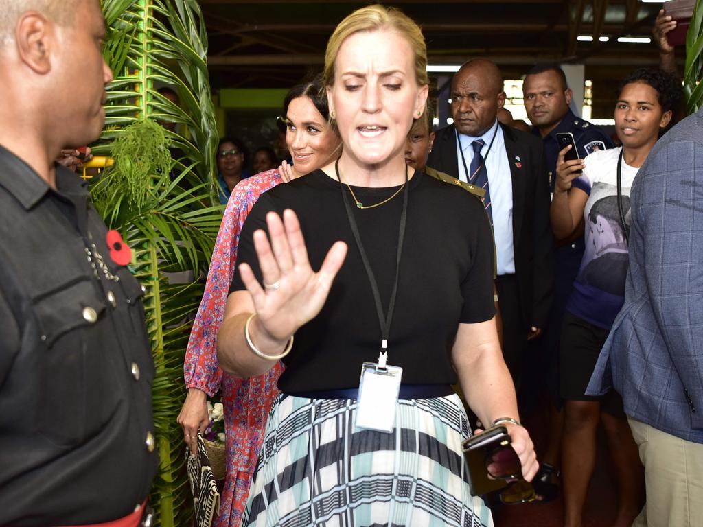 Meghan’s female bodyguard, who  rushed her out of the Suva Municipal Market after an alleged security scare, has quit. Picture: AFP 