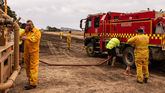 Firefighters fill their tankers to continue their work in containing the outbreaks of spotfires near Glenthompson. Picture: NewsWire / Diego Fedele