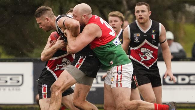 MPNFL: Bonbeach’s Sam Gilbert can’t escape the tackle. Picture: Valeriu Campan