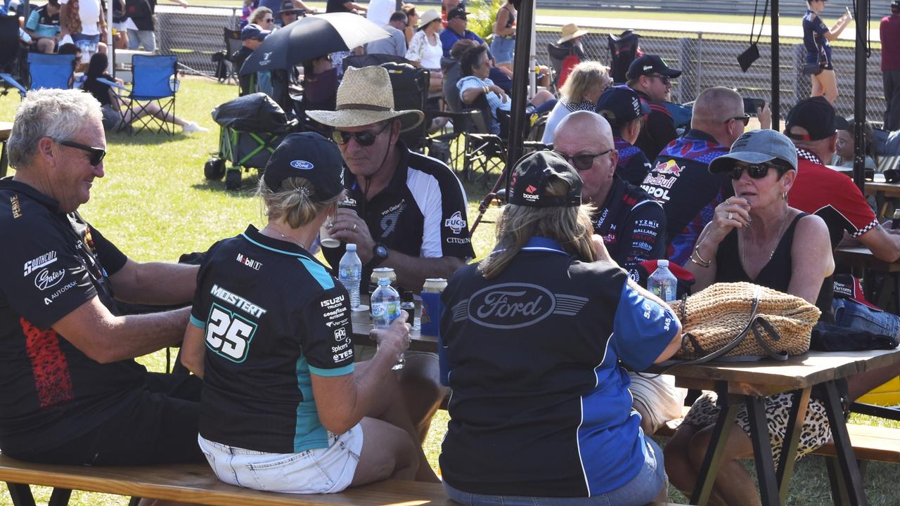 Punters having some thing to eat and drink at The Valley Infield at the 2024 Darwin Triple Crown. Picture: Darcy Jennings.