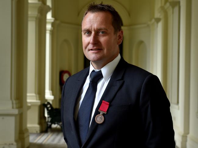 Order of Australia Bravery Award Ceremony at Government House.Det Snr Const Danny Shaddock with his Bravery Medal.Picture: Jay Town