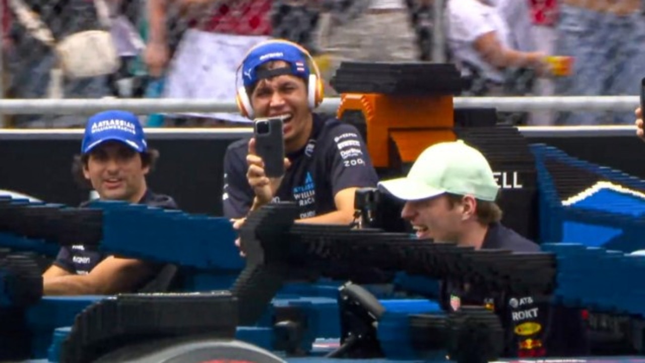 Carlos Sainz and Alex Albon race Max Verstappen in their Lego cars. Photo: X.