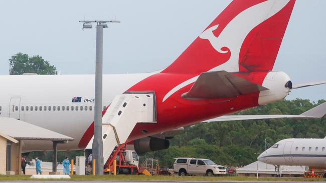 Passengers disembark in Darwin after being airlifted from the Diamond Princess cruise ship. Picture: Glenn Campbell