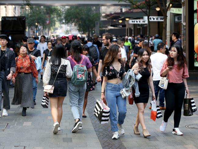 Discounts of up to 70 per cent lured customers into bricks and mortar, and online stores. Picture by Damian Shaw