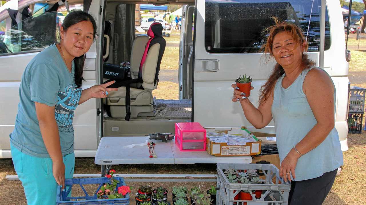 TOP SHOP: Tulang Truong and Narin Shamoun at the Laidley Country Markets this morning. Local and visitors a like to the opportunity to snap up some deals and enjoy the warm weather. Picture: DOMINIC ELSOME