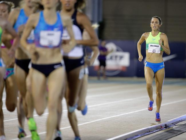 (FILES) In this file photo taken on June 22, 2017, Gabriele Grunewald runs in the Women's 1500 Meter opening round during Day 1 of the 2017 USA Track & Field Championships at Hornet Stadium in Sacramento, California. - US distance runner Gabriele Grunewald, who became an inspirational figure to thousands of fans after continuing to compete at a high level despite a decade-long battle with cancer, has died. She was 32. Grunewald's husband Justin confirmed the news of his wife's death in a post on Instagram on June 11, 2019, two days after revealing her condition had deteriorated and she had entered end-of-life care. (Photo by ANDY LYONS / GETTY IMAGES NORTH AMERICA / AFP)