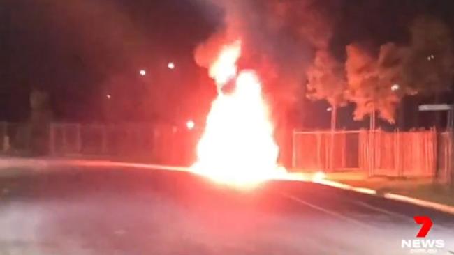 Footage has also emerged of the white BMW engulfed in flames. Picture: Seven News