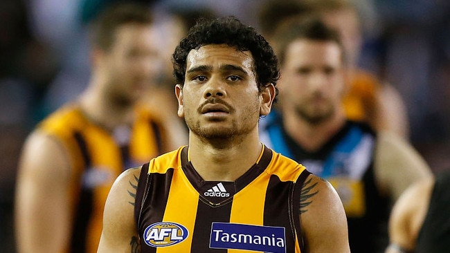 MELBOURNE, AUSTRALIA - AUGUST 21: Cyril Rioli of the Hawks looks dejected after a loss during the 2015 AFL round 21 match between the Hawthorn Hawks and Port Adelaide Power at Etihad Stadium, Melbourne, Australia on August 21, 2015. (Photo by Adam Trafford/AFL Media/Getty Images)