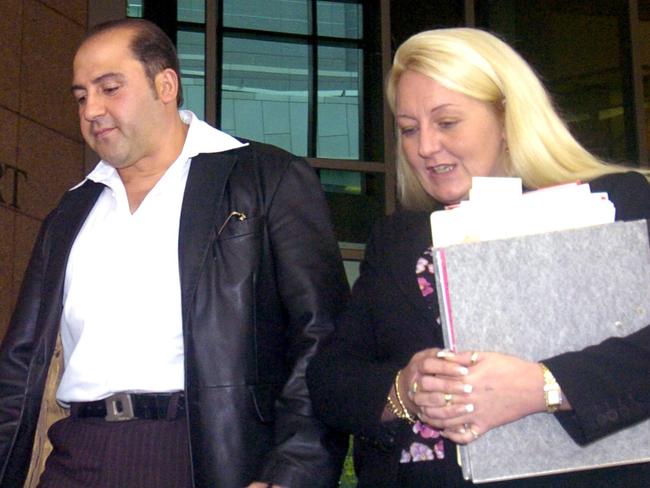 Tony Mokbel  leaves Melbourne Magistrates Court with his lawyer, Nicola Gobbo.