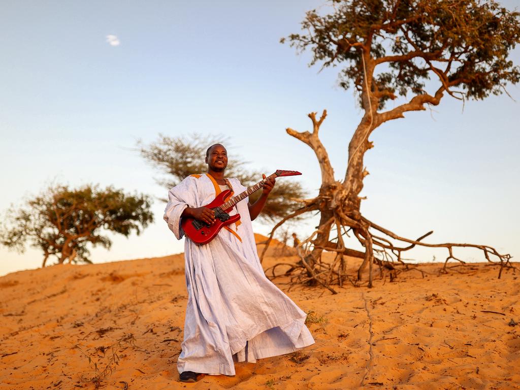 Mauritanian dancers showcase traditional West African culture with vibrant performances in the Lompoul Desert in Senegal. Picture: Cem Ozdel/Anadolu via Getty Images