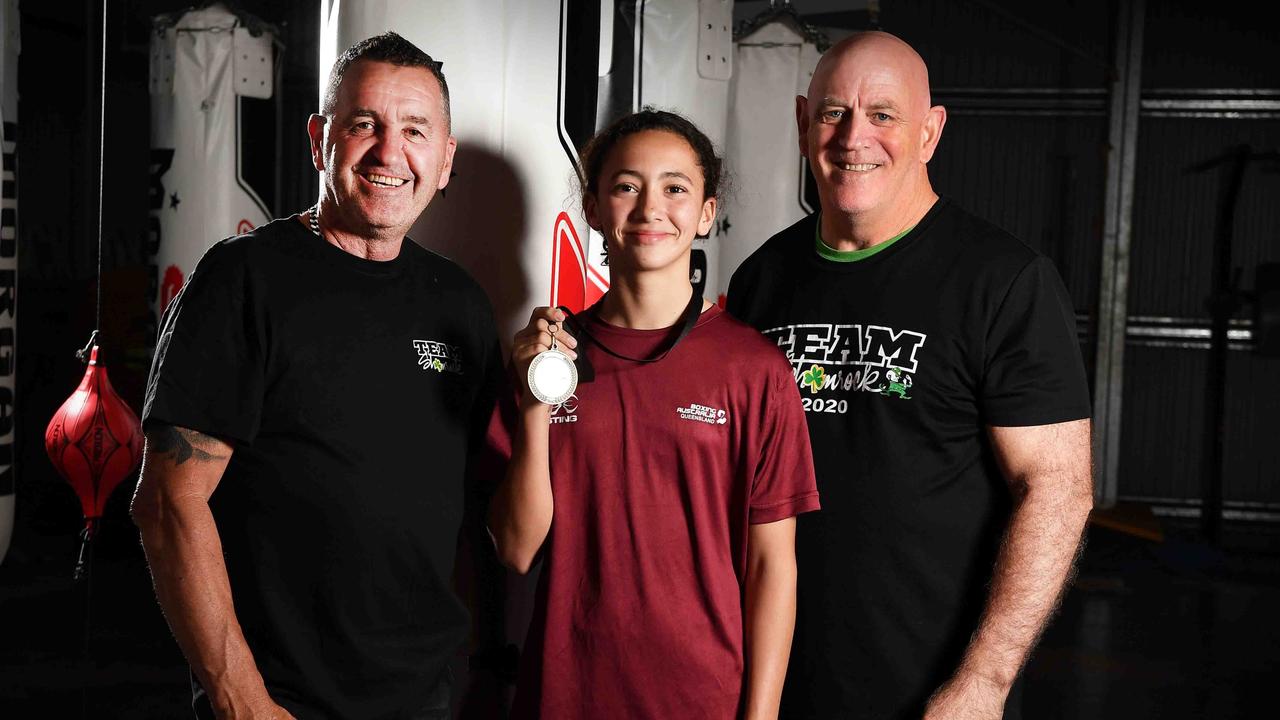 Boxer Tiana Rew alongside her coaches, Mike Foley (left) and Kip Daddo. Picture: Patrick Woods.