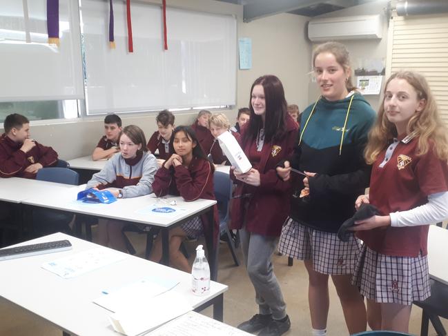 Alstonville High School students Ava Greentree, Zoe Fairfull and Brooklyn Bird presenting during Cows for Careers event.