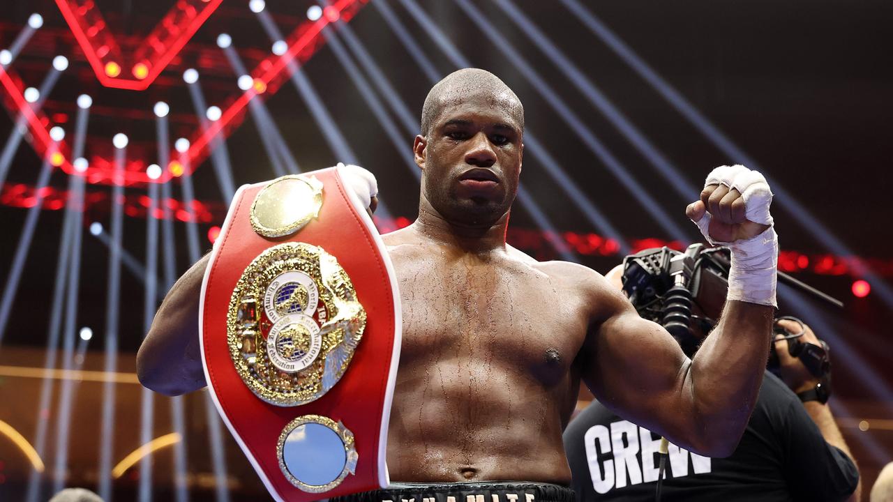 Daniel Dubois of Team Queensberry poses for a photo with his title belt. Photo by Richard Pelham/Getty Images.