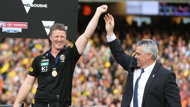 Mark Williams presents Richmond coach Damien Hardwick with the Jock McHale medal at this year’s grand final. Picture: Michael Klein.