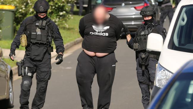 Police detain Helal Safi at South Wentworthville on Wednesday. Picture: NSW Police