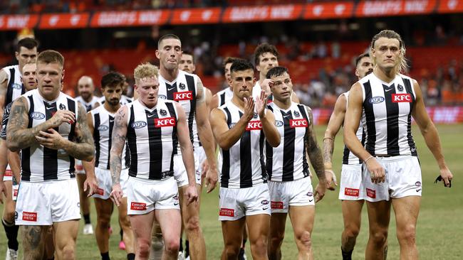 Collingwood's Nick Daicos and Darcy Moore leave the field during the AFL Opening Round match between the GWS Giants and Collingwood Magpies at Engie Stadium, Sydney on  March 9, 2024.  Photo by Phil Hillyard(Image Supplied for Editorial Use only - Phil Hillyard  **NO ON SALES** - Â©Phil Hillyard )