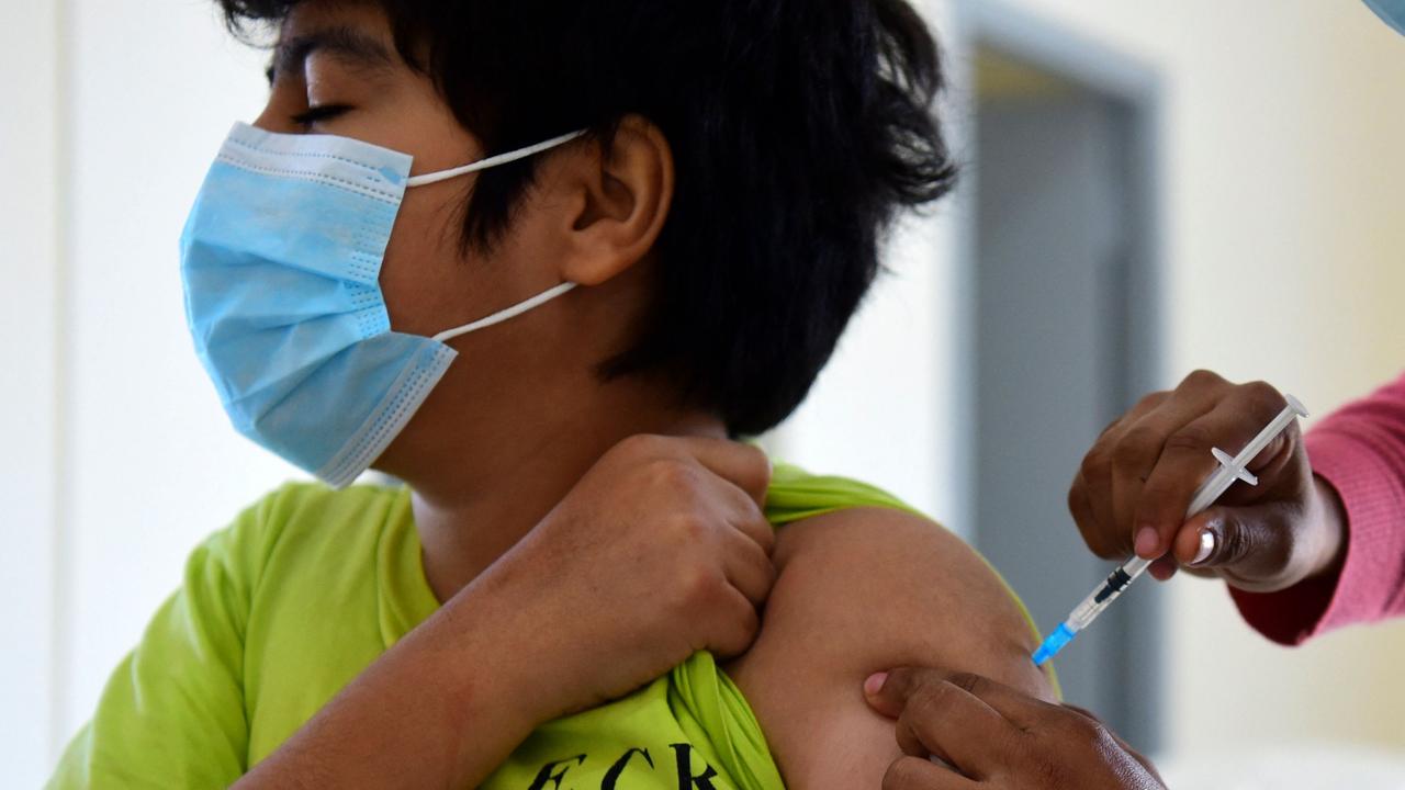 A minor receiving a dose of the Pfizer-BioNTech vaccine against Covid-19 at a vaccination centre in Asuncion, Paraguay.