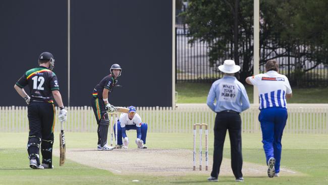 A great season of cricket: Bankstown’s David Lozinski bowls to Penrith’s Matthew Hopkins during a match in February.