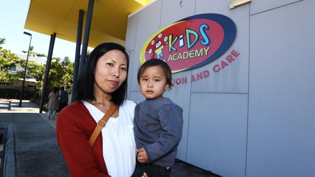 Mum Kotori Subritzky with son Tanerau after Kids Academy Hope Island was closed. Photograph: Jason O'Brien