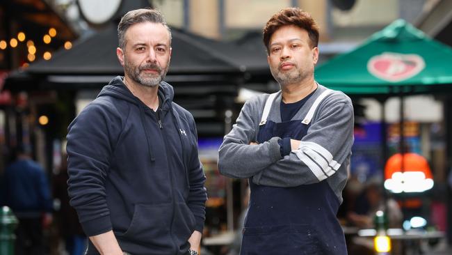 Theo and Johnny Sandish are among Degraves St traders demanding to know where the next injecting room will go. Picture: Brendan Beckett