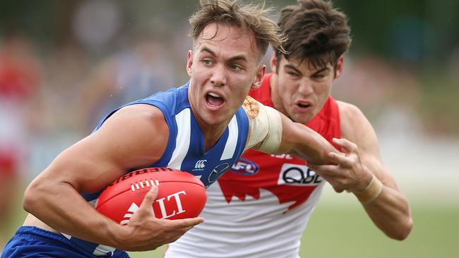 Ryan Clarke in action for North Melbourne against Sydney.