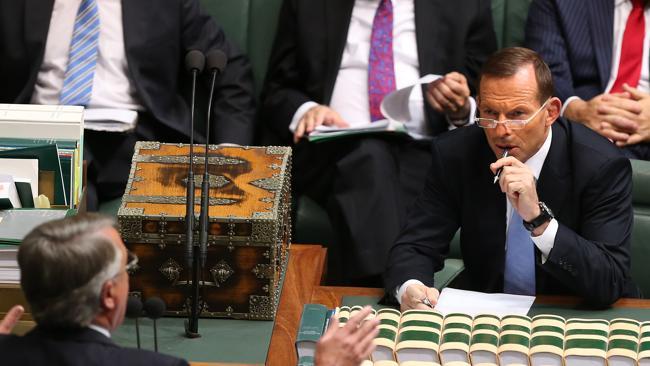 Tony Abbott and Wayne Swan duke it out in parliament. Picture: Kym Smith 