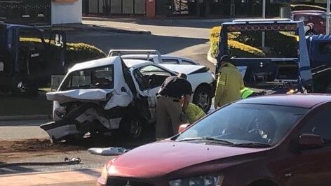 A white hatchback is towed away. Picture: supplied